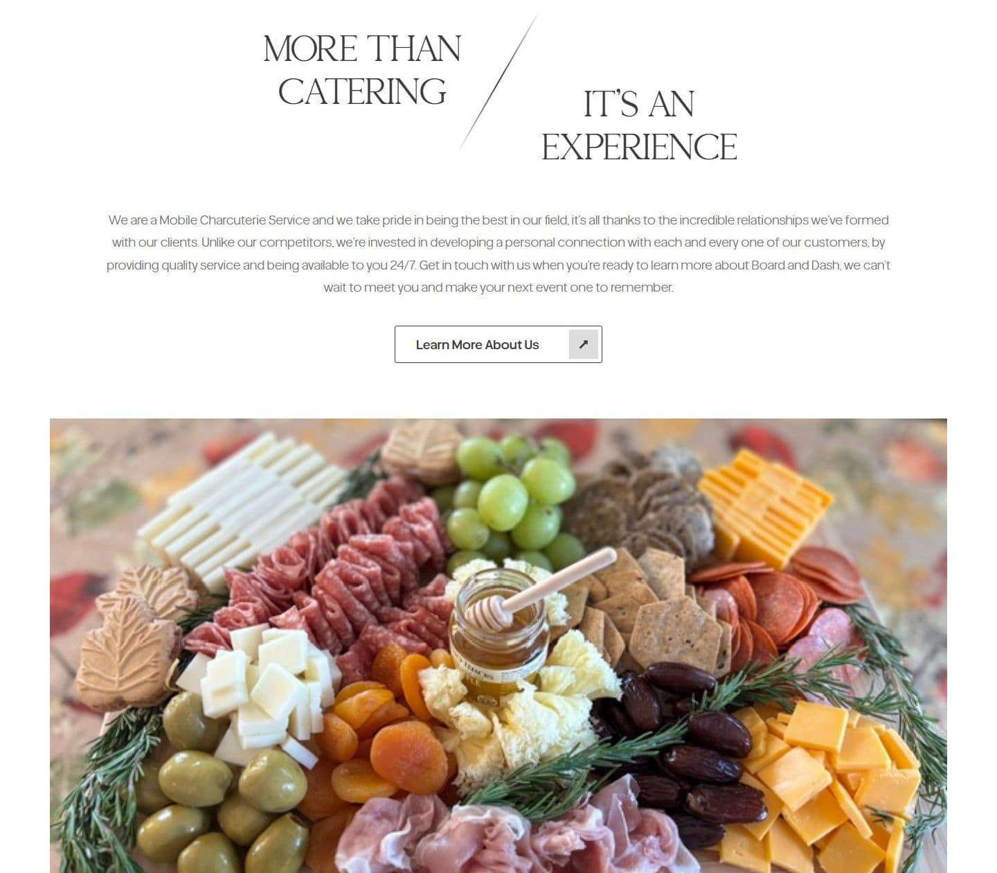 About section of the Board & Dash homepage on desktop, with a charcuterie spread